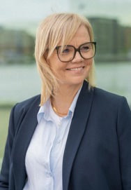 Jannie Guldbrandsen looking to the side with wind in her hair