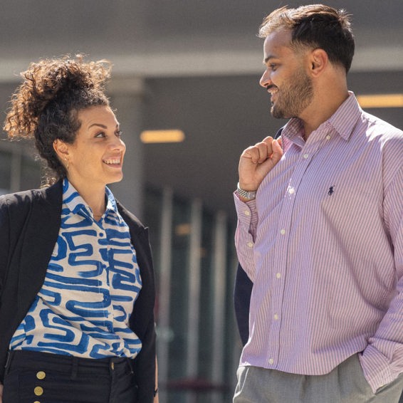 Man and woman looking at each other and talking